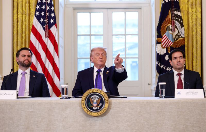 U.S. President Donald Trump takes questions from reporters while Vice President JD Vance and Secretary of State Marco Rubio look on, as they attend a meeting with oil industry executives, at the White House in Washington, D.C., U.S., January 9, 2026. REUTERS/Kevin Lamarque