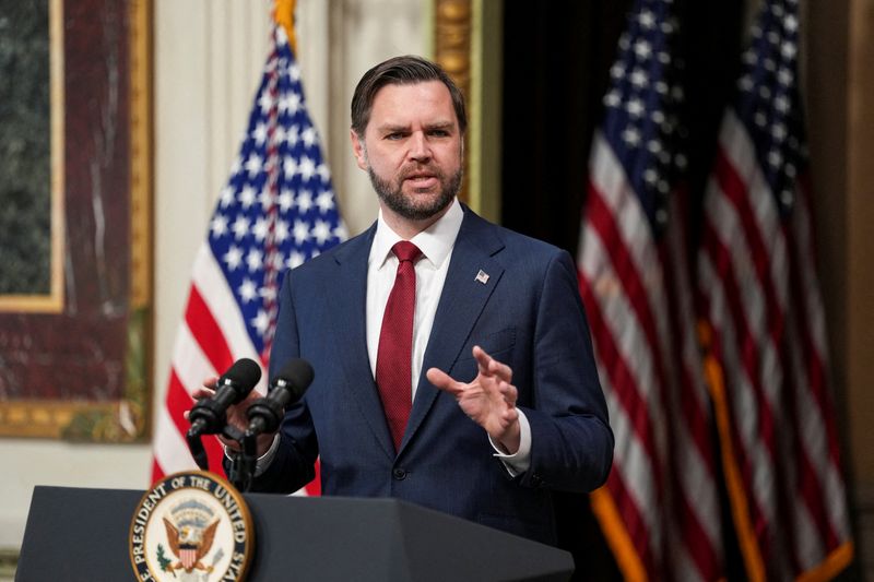 FILE PHOTO: U.S. Vice President JD Vance delivers a speech on the day he administers the oath of office to Colin McDonald, the U.S. Assistant Attorney General in charge of fraud enforcement, in the Indian Treaty Room of the Eisenhower Executive Office Building (EEOB) on the White House campus in Washington, D.C., U.S., April 1, 2026. REUTERS/Ken Cedeno/File Photo