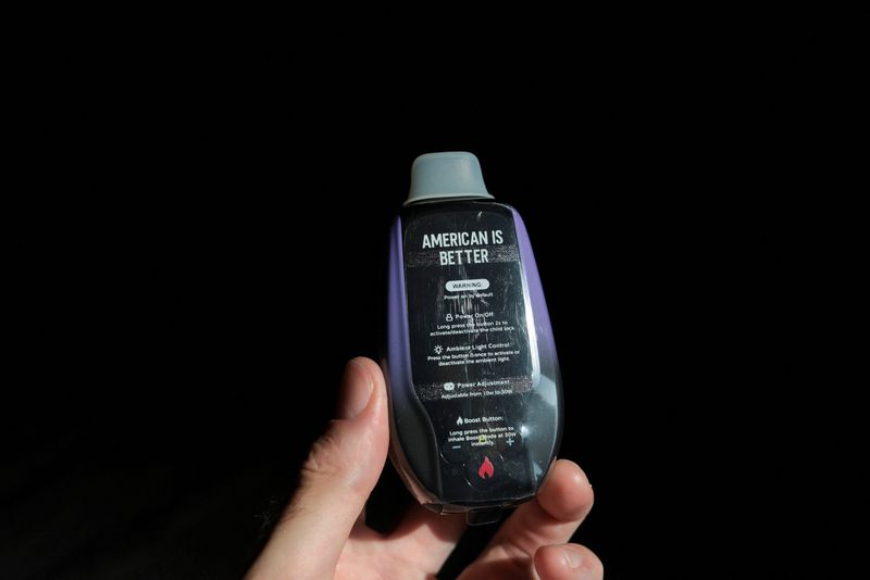 A photo illustration of a One Tank disposable vape device with American branding reflects how some products marketed as "made in the USA" have emerged as Chinese manufacturers adapt to a U.S. regulatory crackdown, according to a Reuters examination of the sector, in Dallas, Texas, U.S., March 29, 2026. REUTERS/Daniel Cole