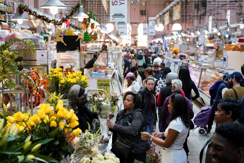People shop at Eastern Market, a public market in the Capitol Hill neighborhood in Washington, D.C., U.S., November 2, 2025. REUTERS/Al Drago