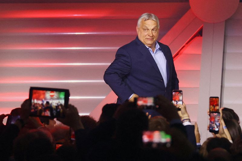 Hungarian Prime Minister Viktor Orban arrives to address supporters after the announcement of the partial results of parliamentary election in Budapest, Hungary, April 12, 2026. REUTERS/Bernadett Szabo