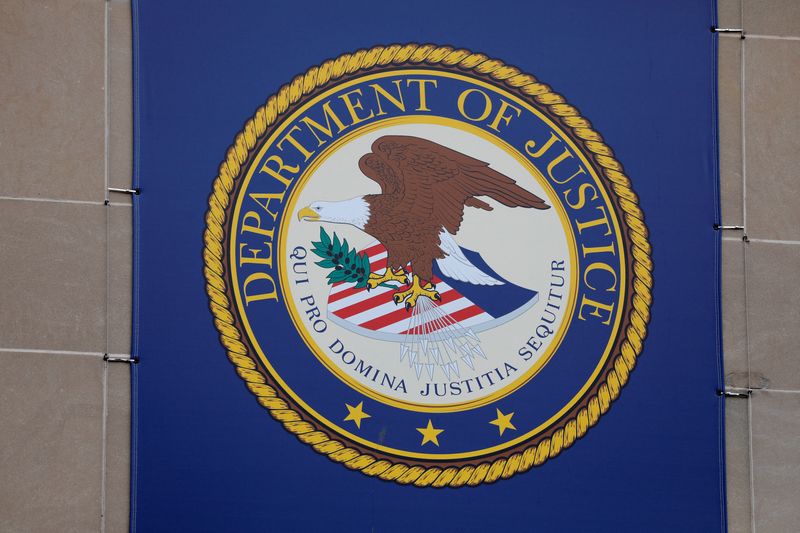 The crest of the United States Department of Justice is seen at its headquarters in Washington, D.C., U.S., May 10, 2021. REUTERS/Andrew Kelly