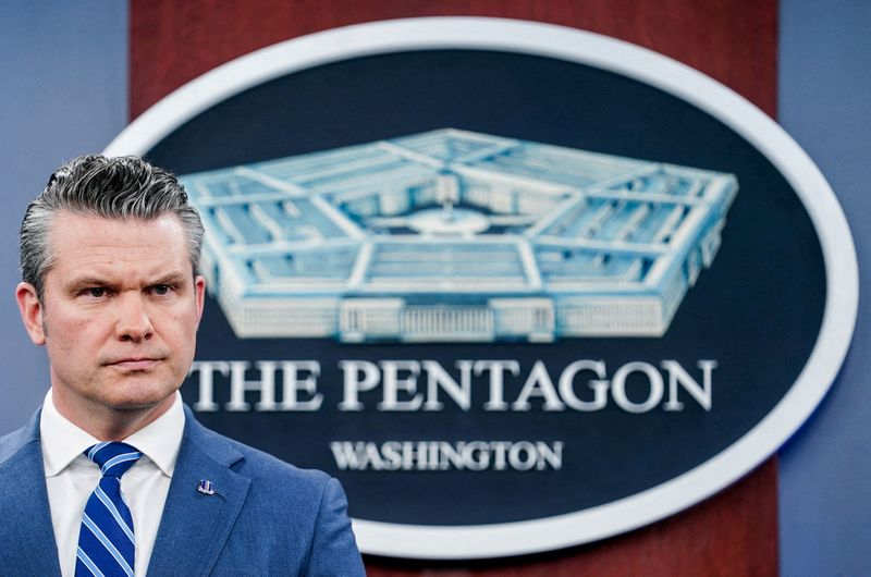 U.S. Secretary of Defense Pete Hegseth looks on during a briefing on the Iran war, at the Pentagon in Washington, D.C., U.S., April 16, 2026. REUTERS/Nathan Howard