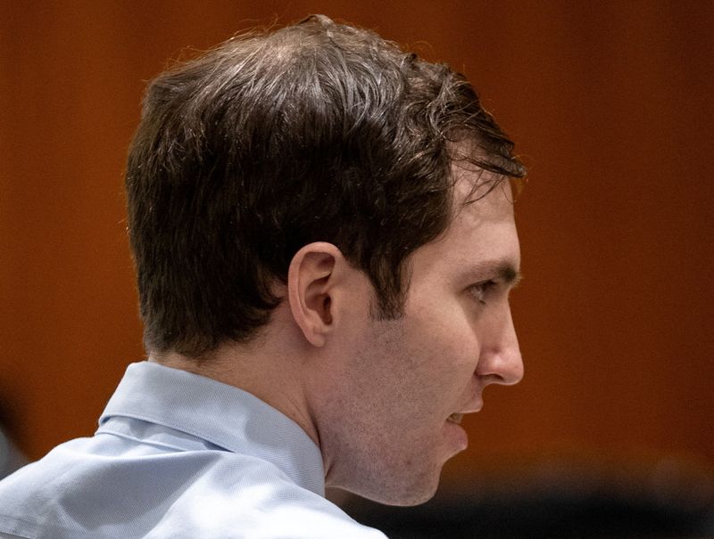 Tyler Robinson speaks with his attorney Kathryn Nester (not pictured) during a hearing for Robinson, accused in the fatal shooting of conservative activist Charlie Kirk, in 4th District Court in Provo, Utah, U.S., April 17, 2026.  Trent Nelson/Pool via REUTERS