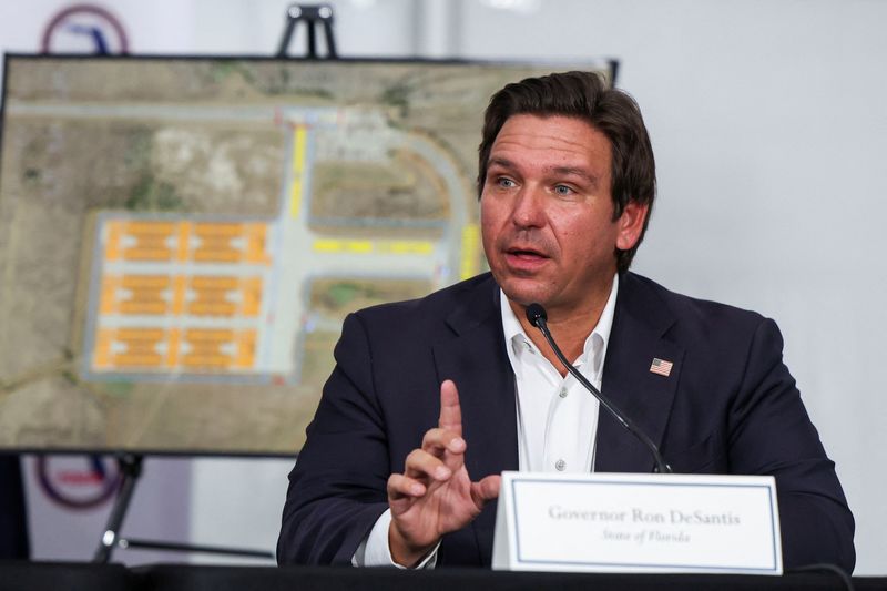 FILE PHOTO: Florida Governor Ron DeSantis visits a temporary migrant detention center informally known as "Alligator Alcatraz" in Ochopee, Florida, U.S., July 1, 2025. REUTERS/Evelyn Hockstein/ File Photo