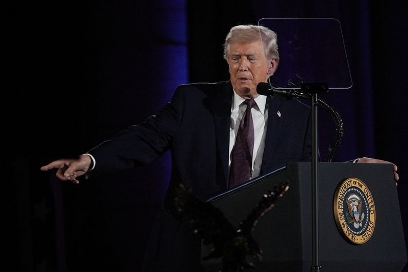 U.S. President Donald Trump points as he delivers a speech during the National Republican Congressional Committee (NRCC) annual fundraising dinner in Washington, D.C., U.S., March 25, 2026. REUTERS/Ken Cedeno
