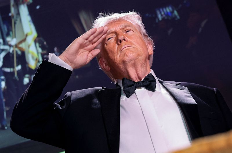 U.S. President Donald Trump salutes during the annual White House Correspondents' Association dinner in Washington, D.C., U.S., April 25, 2026. REUTERS/Jonathan Ernst