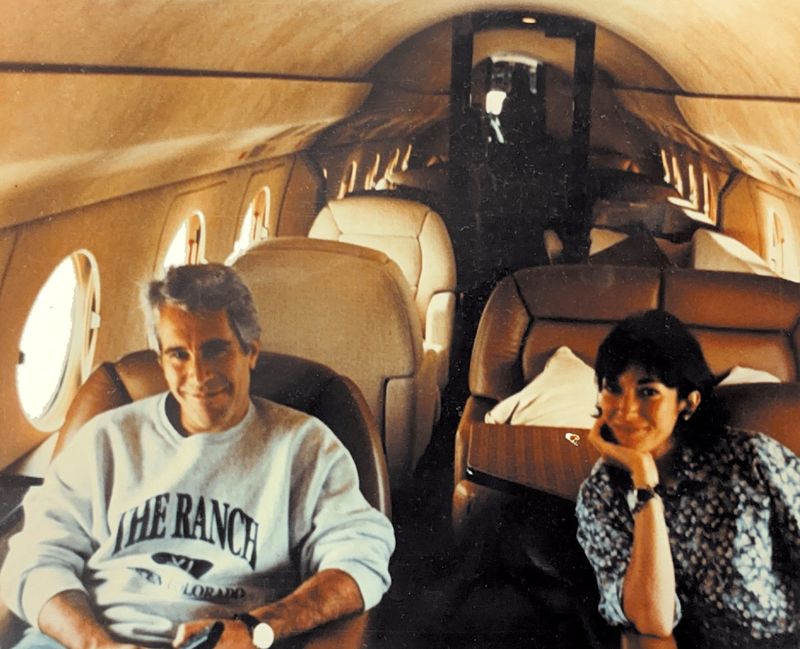FILE PHOTO: Ghislaine Maxwell and Jeffrey Epstein are seen in this image released by the Department of Justice in Washington, D.C., U.S., on December 19, 2025 as part of a new trove of documents from its investigations into the late financier and convicted sex offender Jeffrey Epstein. U.S. Justice Department/Handout via REUTERS/ File photo