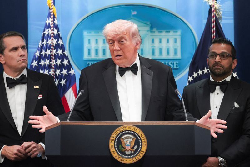 U.S. President Donald Trump speaks next to Federal Bureau of Investigation (FBI) Director Kash Patel,  and acting Attorney General Todd Blanche at a press briefing at the White House, following a shooting incident during the annual White House Correspondents’ Association dinner, in Washington, D.C., U.S., April 25, 2026 REUTERS/Jonathan Ernst