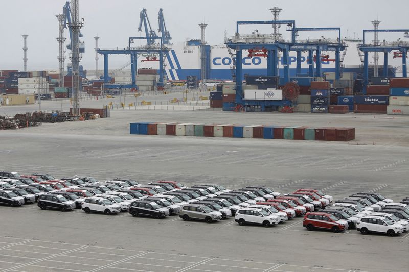 FILE PHOTO: Chinese electric vehicles are parked at the Chancay megaport as Chinese automakers are gaining ground against traditional brands in the South American electric vehicle market, in Chancay, Peru November 13, 2025. REUTERS/Gerardo Marin/File Photo