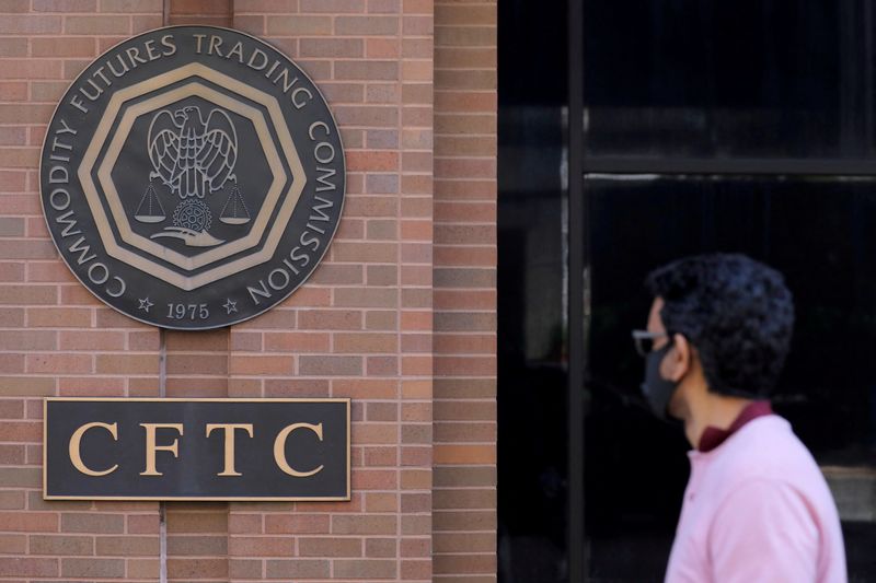 FILE PHOTO: Signage is seen outside of the US Commodity Futures Trading Commission (CFTC) in Washington, D.C., U.S., August 30, 2020. REUTERS/Andrew Kelly/File Photo