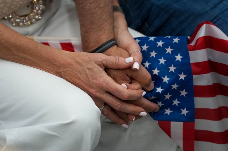 Supporters pray during a campaign rally against Virginia Democrats' proposed state redistricting constitutional amendment ahead of the referendum special election on April 21, in Bridgewater, Virginia, April 11, 2026. REUTERS/Ken Cedeno