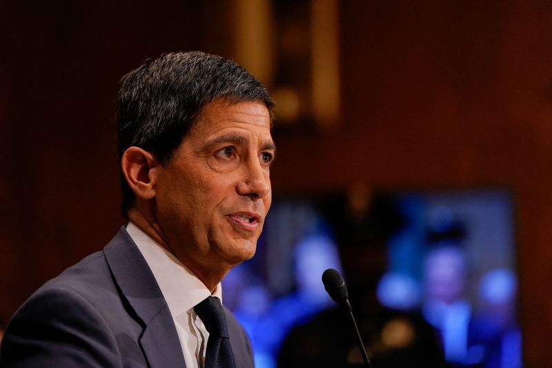 FILE PHOTO: Kevin Warsh, U.S. President Donald Trump's nominee to be next chair of the Federal Reserve, testifies before a Senate Banking Committee confirmation hearing on Capitol Hill in Washington, D.C., U.S., April 21, 2026. REUTERS/Elizabeth Frantz/File Photo