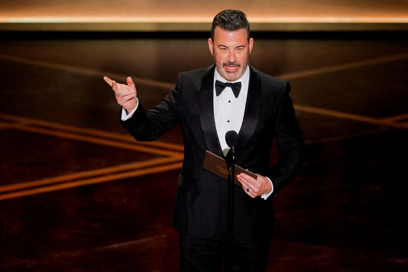 FILE PHOTO: Jimmy Kimmel speaks onstage during the Oscars show at the 98th Academy Awards in Hollywood, Los Angeles, California, U.S., March 15, 2026. REUTERS/Mike Blake/File Photo
