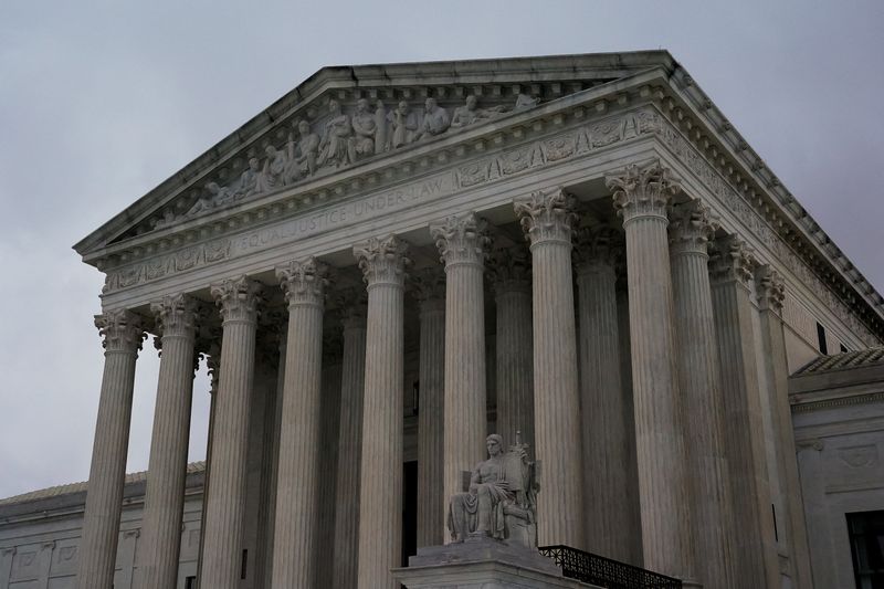 The U.S. Supreme Court building is seen in the rain in Washington, U.S., October 2, 2022. REUTERS/Elizabeth Frantz