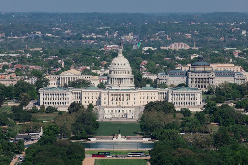 FILE PHOTO: The U.S. Capitol Building and Library of Congress in Washington, D.C., U.S., April 16, 2026. REUTERS/Kylie Cooper/File Photo/File Photo