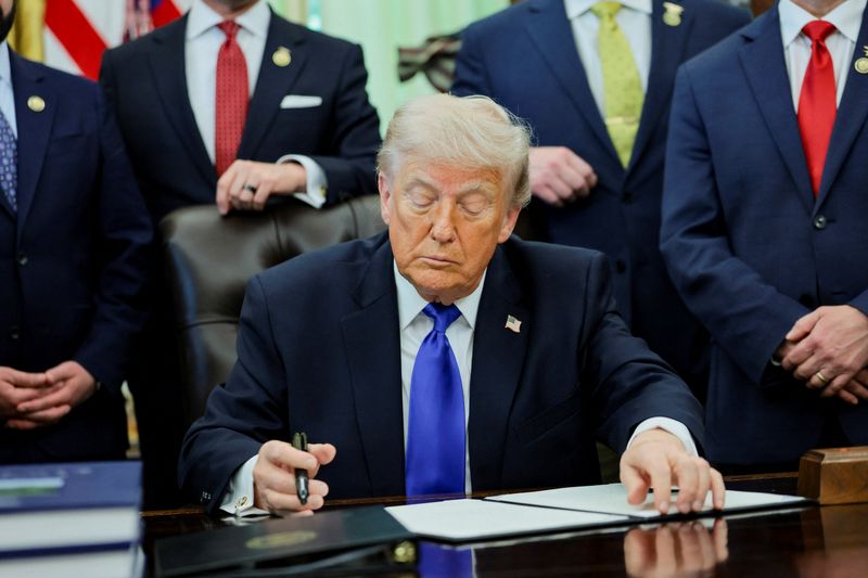 U.S. President Donald Trump prepares to sign an executive order at the White House in Washington, D.C., U.S., April 30, 2026. REUTERS/Jonathan Ernst