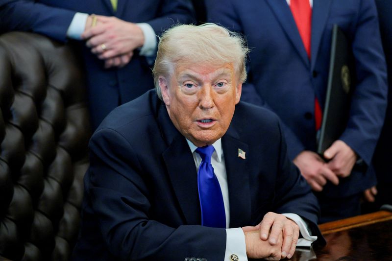 U.S. President Donald Trump takes questions from the media after signing an executive order in the Oval Office at the White House in Washington, D.C., U.S., April 30, 2026. REUTERS/Jonathan Ernst