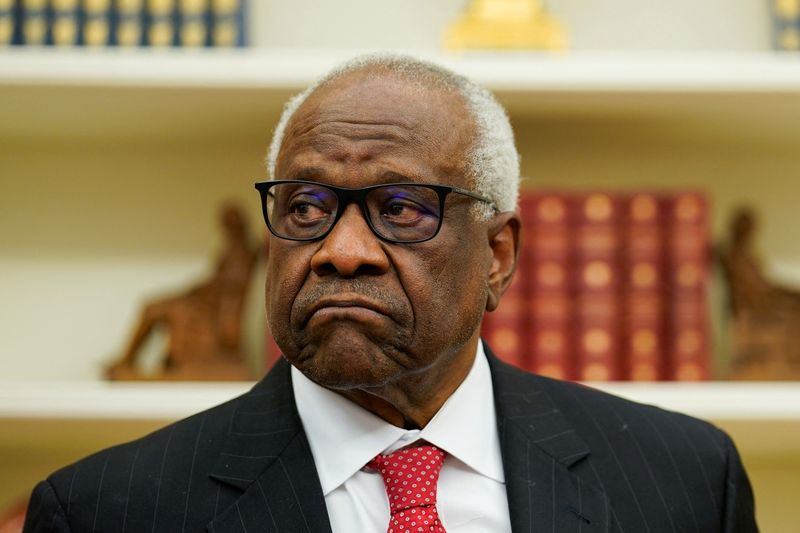 FILE PHOTO: U.S. Supreme Court Associate Justice Clarence Thomas looks on, on the day of swearing ceremony of Pam Bondi as U.S. Attorney General at the White House in Washington, U.S., February 5, 2025. REUTERS/Kent Nishimura/File photo