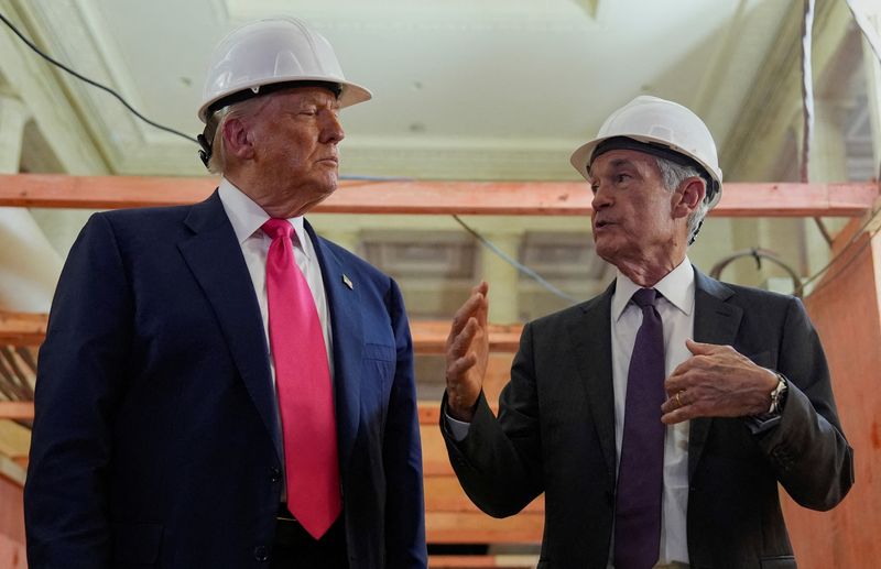 FILE PHOTO: U.S. President Donald Trump and Federal Reserve Chair Jerome Powell speak during a tour of the Federal Reserve Board building, which is currently undergoing renovations, in Washington, D.C., U.S., July 24, 2025. REUTERS/Kent Nishimura/File Photo