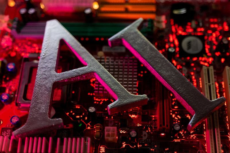 FILE PHOTO: AI (Artificial Intelligence) letters are placed on computer motherboard in this illustration taken, June 23, 2023. REUTERS/Dado Ruvic/Illustration/File Photo