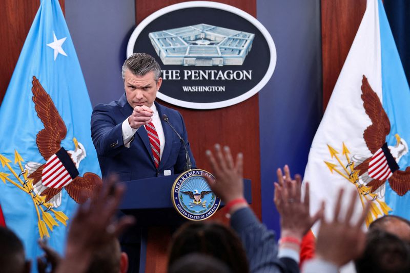 U.S. Secretary of Defense Pete Hegseth holds a briefing on the Iran war, with Chairman of the Joint Chiefs of Staff General Dan Caine (not pictured), at the Pentagon in Washington, D.C., U.S., May 5, 2026. REUTERS/Kevin Lamarque
