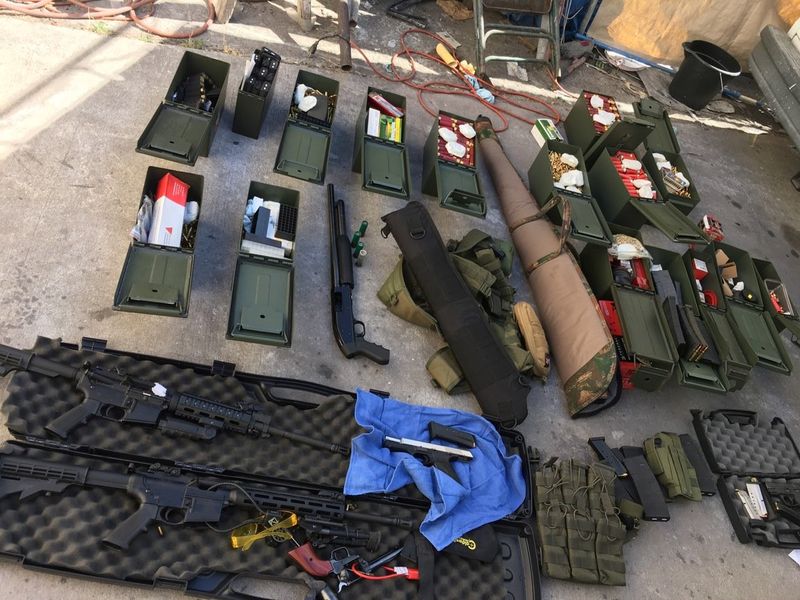Illegal high-capacity magazines and an assault rifle along with multiple guns, ammunition are seen in this Long Beach Police Department (LBPD) photo in Long Beach, California, U.S., released on August 21, 2019.    Courtesy LBPD/Handout via REUTERS    ATTENTION EDITORS - THIS IMAGE HAS BEEN SUPPLIED BY A THIRD PARTY.