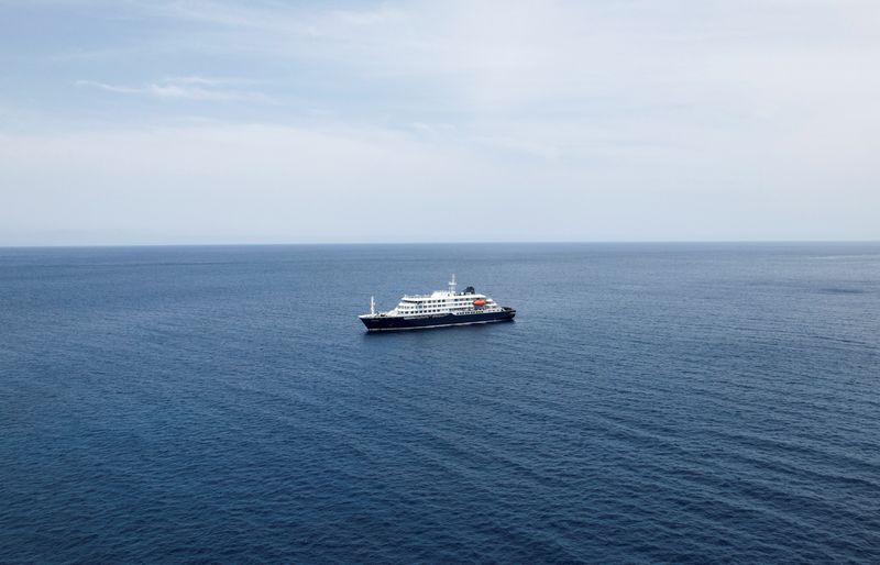 A drone view of the cruise ship MV Hondius, carrying passengers suspected of having cases of hantavirus on board, as it prepares to leave Praia, Cape Verde, May 6, 2026. REUTERS/Danilson Sequeira