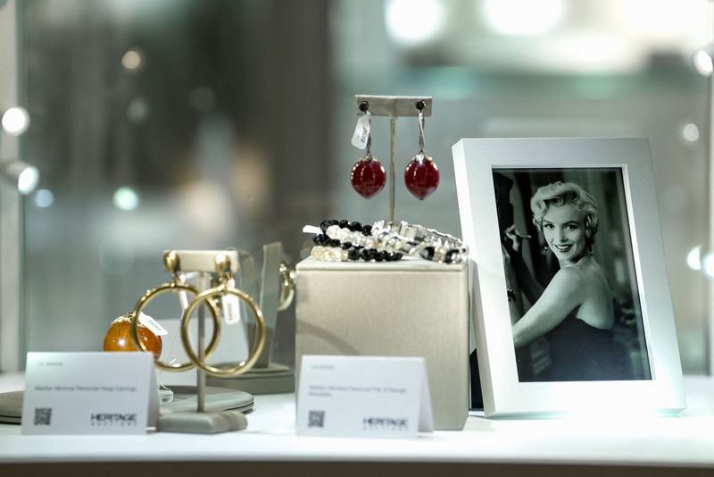 Memorabilia belonging to late model and movie star Marilyn Monroe is displayed alongside a photograph during a preview ahead of an upcoming auction in Los Angeles, California, U.S., May 8, 2026. REUTERS/Arafat Barbakh
