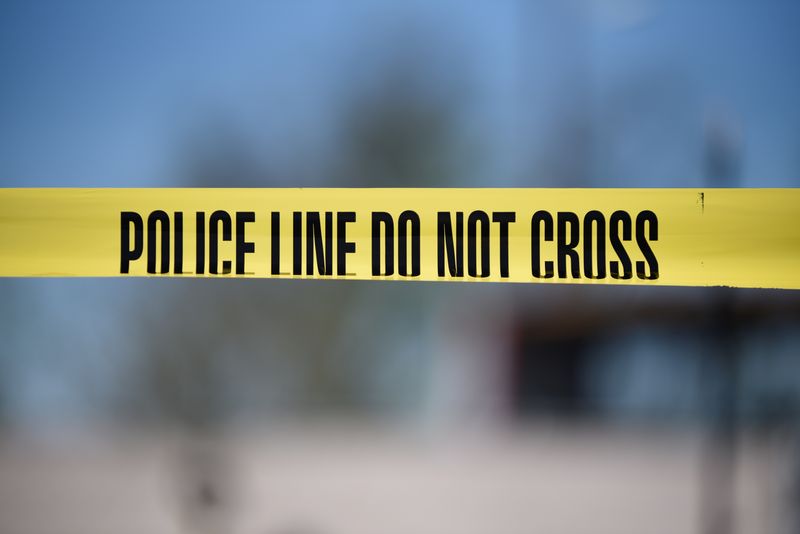 FILE PHOTO: Crime scene tape blocks off an area designated for the media in Texas, U.S., March 20, 2018. REUTERS/Sergio Flores/File Photo