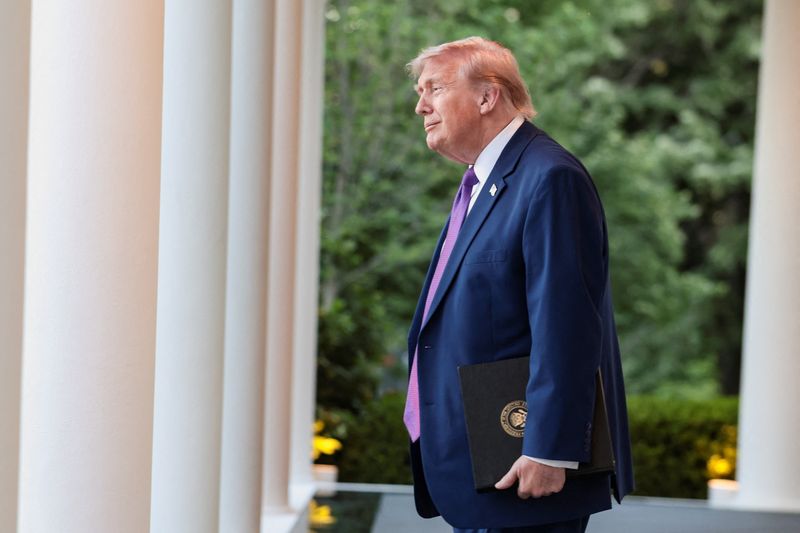 U.S. President Donald Trump prepares to deliver remarks as he hosts his second 'Rose Garden Club' dinner in honour of Police Week at the White House in Washington, D.C., U.S., May 11, 2026. REUTERS/Evelyn Hockstein