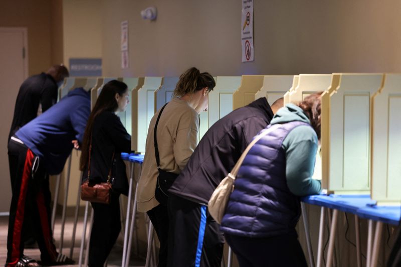 Voters are seen in this file photo, in Omaha, Nebraska, U.S., November 4, 2024. REUTERS/Scott Morgan