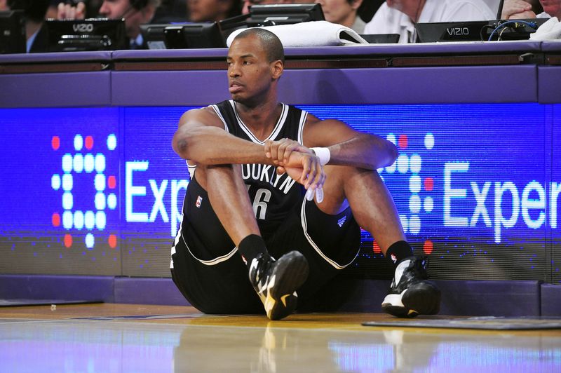 February 23, 2014; Los Angeles, CA, USA; Brooklyn Nets center Jason Collins (46) waits to enter the game against the Los Angeles Lakers during the second half at Staples Center. Mandatory Credit: Gary A. Vasquez-USA TODAY Sports
