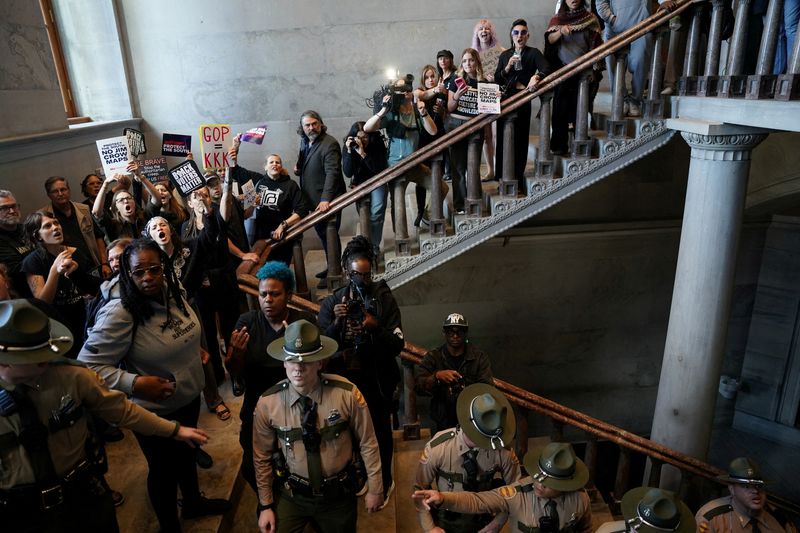 FILE PHOTO: Demonstrators protest inside the Tennessee state Capitol on the final day of a special session in Nashville, Tennessee, U.S., May 7, 2026. REUTERS/Seth Herald/File Photo