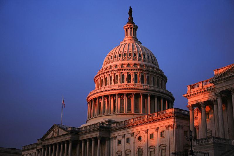 The Capitol Building, weeks into the continuing U.S. government shutdown on Capitol Hill, stands in Washington, D.C., U.S., October 18, 2025. REUTERS/Aaron Schwartz/File Photo