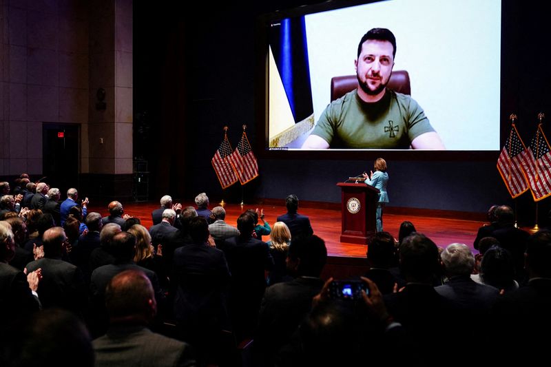 FILE PHOTO: Ukraine’s President Volodymyr Zelenskiy delivers a video address to senators and members of the House of Representatives gathered in the Capitol Visitor Center Congressional Auditorium at the U.S. Capitol in Washington, U.S., March 16, 2022. REUTERS/Sarah Silbiger/Pool/File Photo