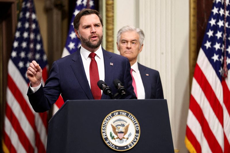 FILE PHOTO: U.S. Vice President JD Vance speaks next to Administrator for the Centers for Medicare & Medicaid Services Mehmet Oz about combating fraud at the Eisenhower Executive Office Building in Washington, D.C., U.S, February 25, 2026.  REUTERS/Kevin Lamarque/File Photo