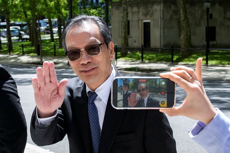 FILE PHOTO: Lu Jianwang, a U.S. citizen charged with conspiring to act as an agent of the Chinese government by helping set up a Chinese 'secret police station' arrives at Brooklyn federal court during his trial in New York City, U.S., May 12, 2026.  REUTERS/Eduardo Munoz/File Photo