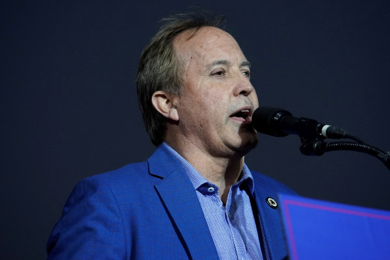 FILE PHOTO: Attorney General of Texas Ken Paxton speaks during former U.S. President Donald Trump's rally, in Conroe, Texas, U.S., January 29, 2022. REUTERS/Go Nakamura?/File Photo