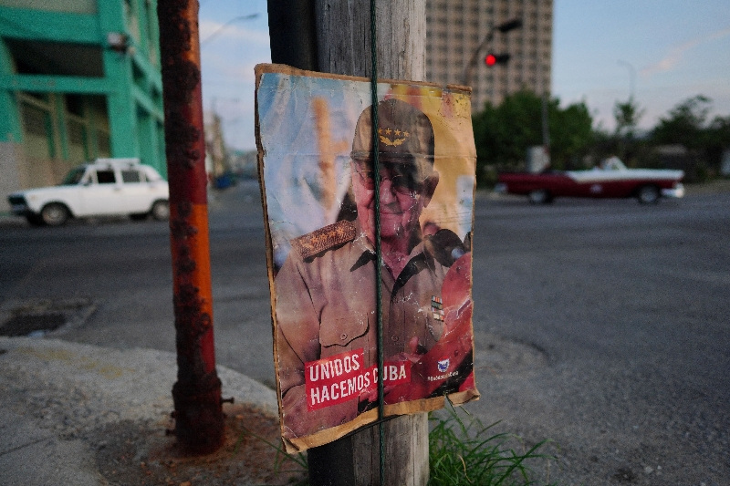 An image of former Cuban President Raul Castro hangs on the street in Havana, Cuba, May 9, 2023. REUTERS/Alexandre Meneghini