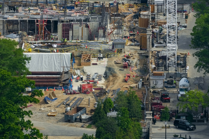 Aerial view from the top of the Washington Monument shows construction crews as they continue site preparation for a planned White House ballroom in the area of the former East Wing in Washington, D.C., U.S., May 2, 2026. REUTERS/Ken Cedeno