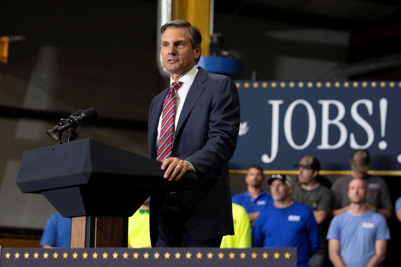 Derek Dooley, former University of Tennessee football coach and Republican candidate for U.S Senate, speaks during a Republican political event about the One Big Beautiful Bill  at ALTA Refrigeration in Peachtree City, Georgia, U.S., August 21, 2025.  REUTERS/Alyssa Pointer