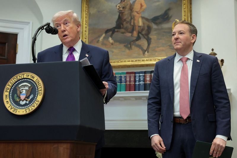 U.S. President Donald Trump makes an announcement, joined by Environmental Protection Agency (EPA) Administrator Lee Zeldin, at the White House in Washington, D.C., U.S., February 12, 2026. REUTERS/Jonathan Ernst
