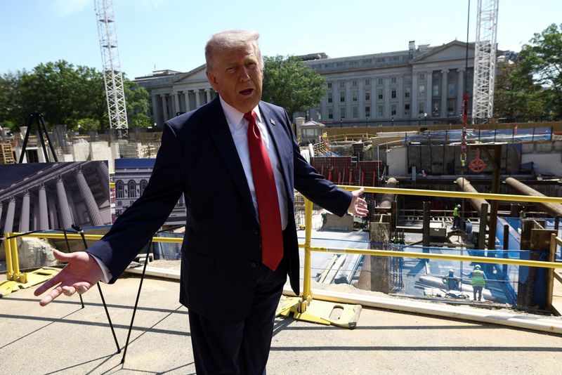 U..S. President Donald Trump gestures at the site of ongoing construction of the planned White House ballroom in Washington, D.C., U.S., May 19, 2026. REUTERS/Kevin Lamarque