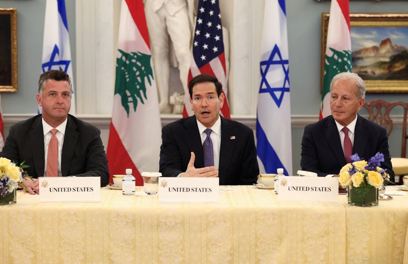 FILE PHOTO: Secretary of State Marco Rubio, flanked by U.S. State Department Counsellor Michael Needham (left) and U.S. Ambassador to Lebanon Michel Issa, in Washington, D.C., April 14, 2026. REUTERS/Kevin Lamarque/ File Photo