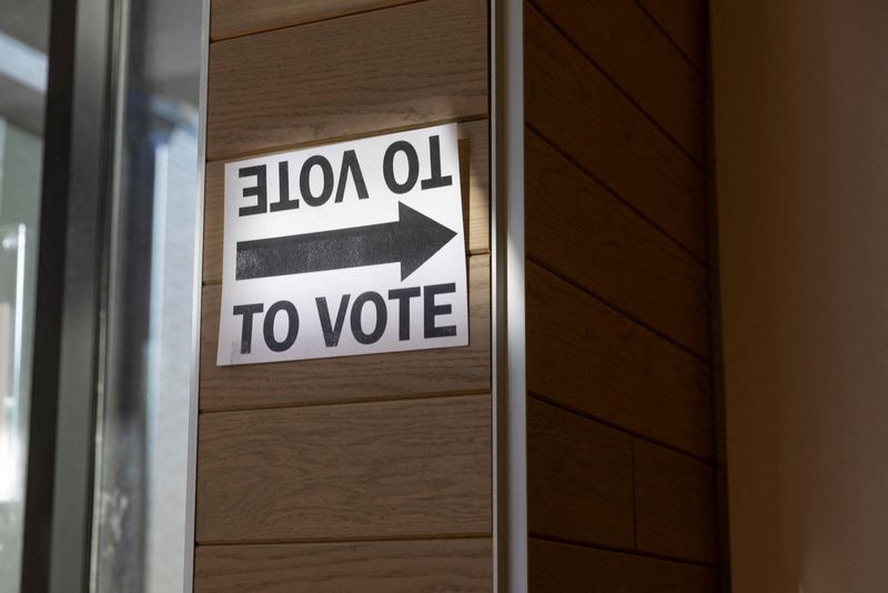 A voting sign is displayed at Metropolitan Library during the Georgia Midterm Primary Election in Atlanta, Georgia, U.S., May 19, 2026.  REUTERS/Alyssa Pointer     TPX IMAGES OF THE DAY