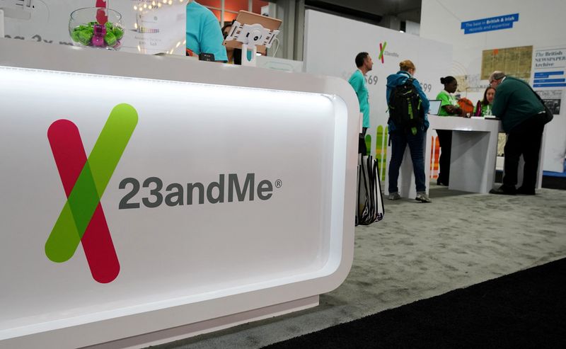 FILE PHOTO: Attendees visit the 23andMe booth at the RootsTech annual genealogical event in Salt Lake City, Utah, U.S., February 28, 2019.  REUTERS/George Frey/File Photo
