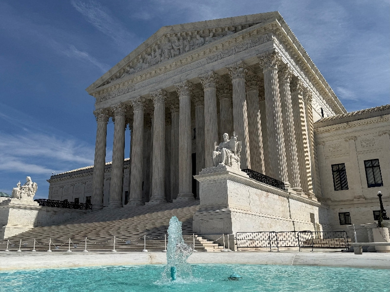 FILE PHOTO: A fountain outside the U.S. Supreme Court building in Washington, D.C., U.S., March 14, 2026. REUTERS/Will Dunham/File Photo