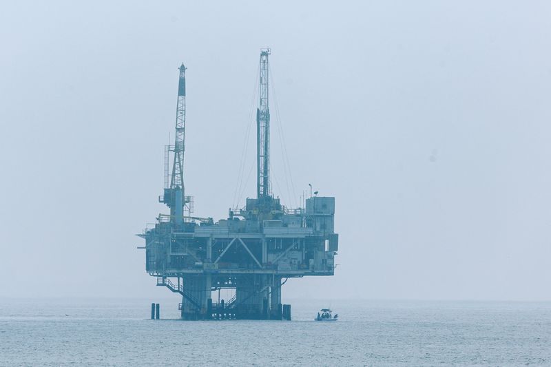 An offshore oil rig platform off the coast of California from Seal Beach, California, U.S., November 11, 2025.  REUTERS/Mike Blake/File Photo