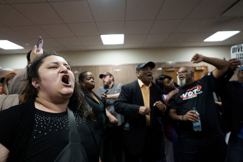 FILE PHOTO: A crowd protest in front of the hearing room, during a public hearing on redistricting as Louisiana Republicans pursue a new congressional voting map ahead of the November midterm elections, in Baton Rouge, Louisiana, U.S., May 8, 2026. REUTERS/Wayan Barre/File Photo